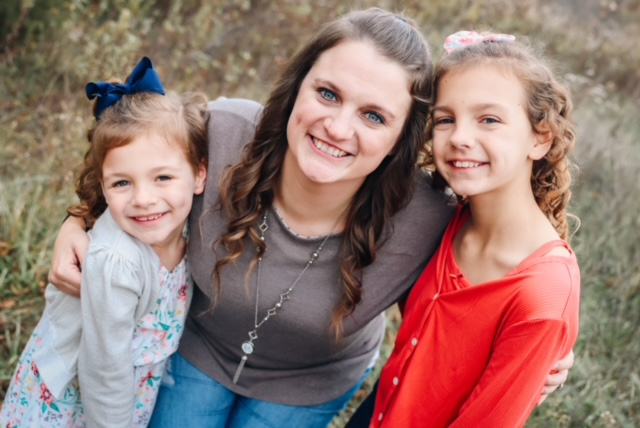 Kyleen with her two daughters. 
